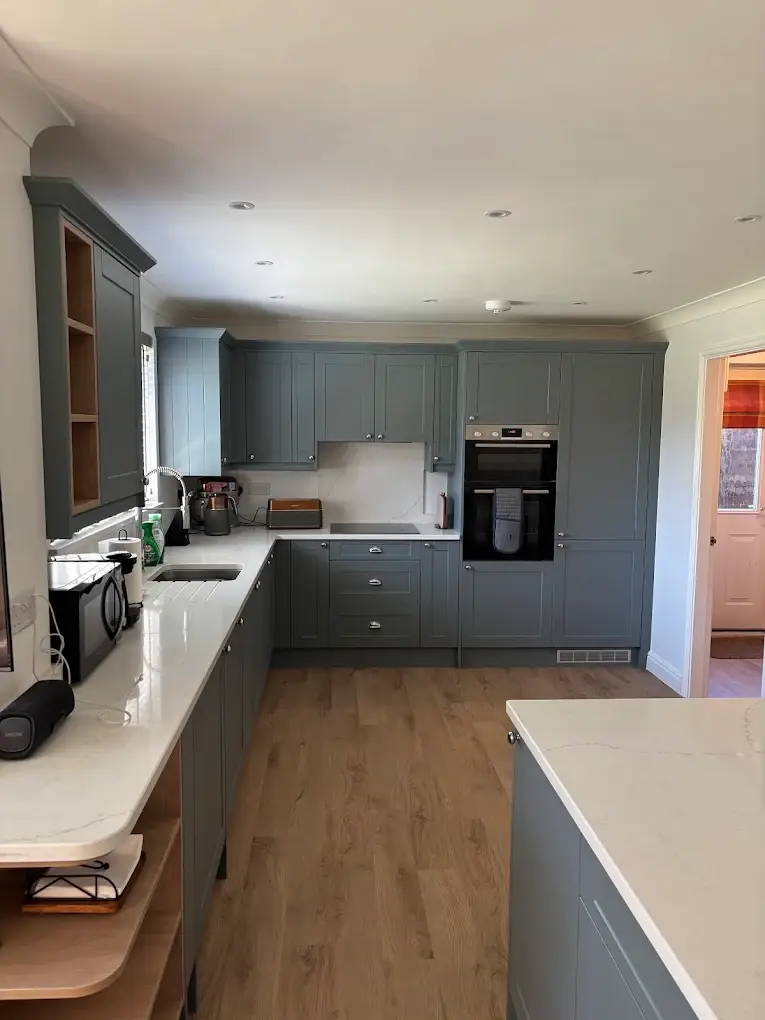 Modern Blue Kitchen With White Quartz Worktops