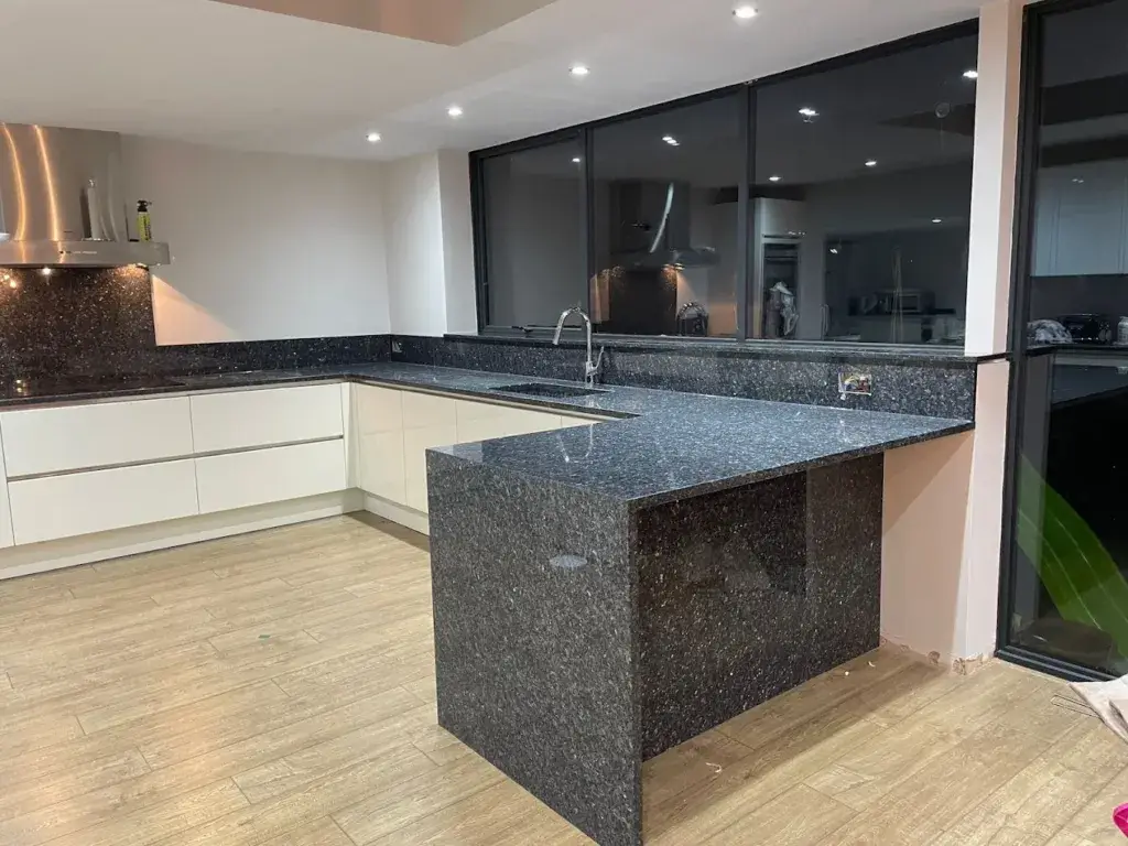 Modern Kitchen With Blue Pearl Granite Worktops