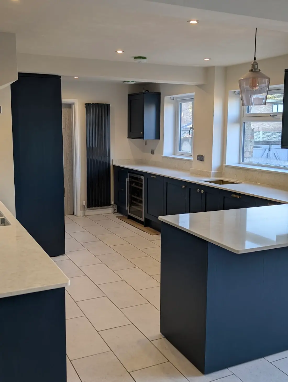 Modern Kitchen With Navy Cabinets.